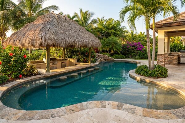 Luxury resort-style pool with swim-up bar in Florida