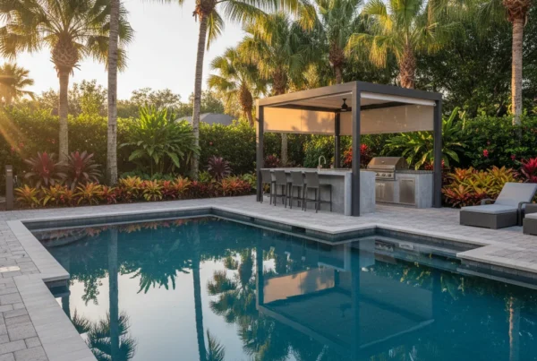 Custom saltwater pool with tropical landscaping in Central Florida backyard