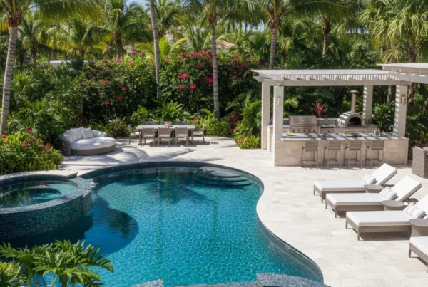 Custom pool and outdoor living area with tropical landscaping in Florida