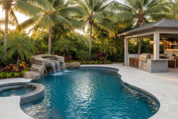 Custom pool and outdoor living area with tropical landscaping in Florida