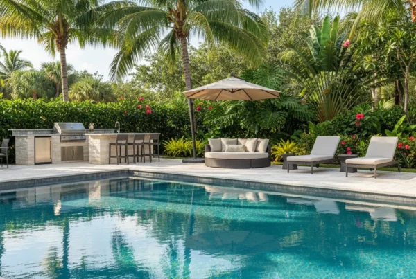 custom pool and outdoor living area with tropical landscaping in Florida